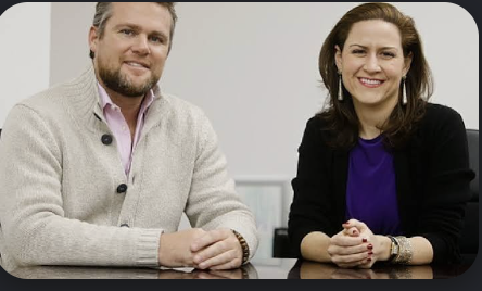 William Skelley with a colleague at a business meeting